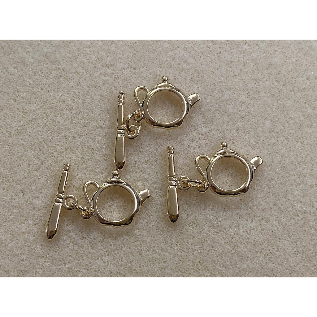 BROCHE FORMA TETERA GOLDPLATED