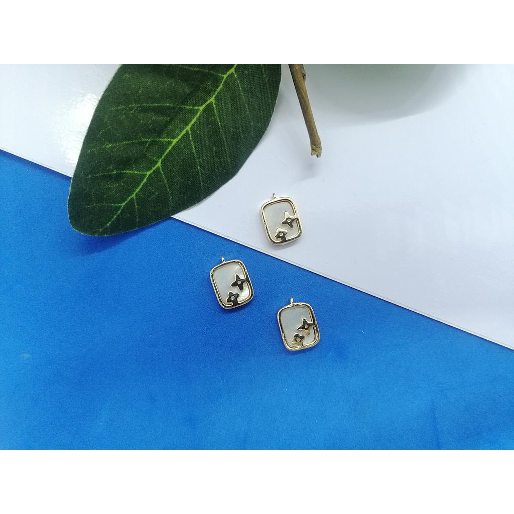 DIJE ESTRELLAS ELECTROENCHAPADO Y CONCHA 13MM