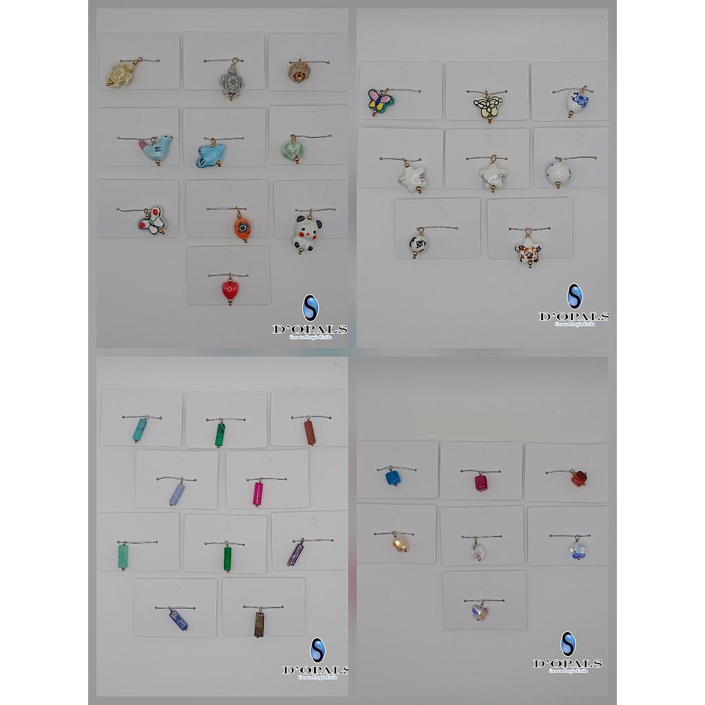 DIJES DE CERAMICA CON NUDO DE ROSARIO