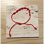 PULSERA DE HILO 7 NUDOS ROJA